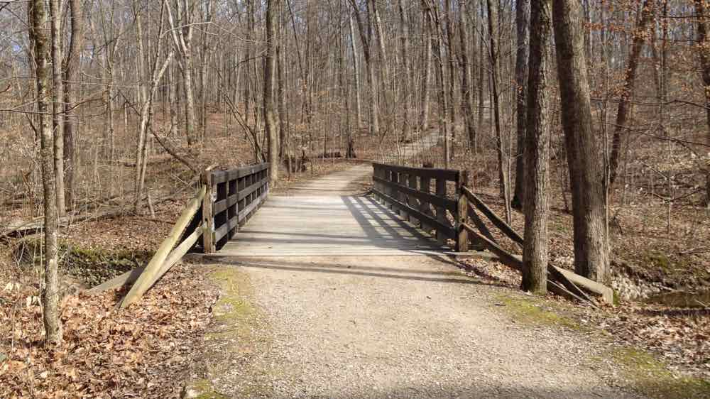 A bridge on the Brookside Trail at Blendon Woods Metro Park crossing over a small creek