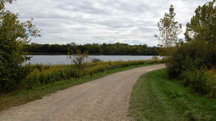 A trail by a lake at Prairie Oaks Metro Park